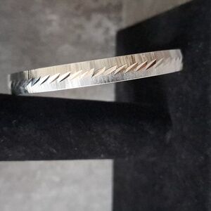 Vintage Monet Diamond Cut Silverplated Bangle